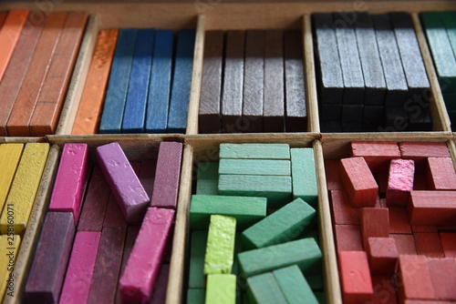 Colourful cuisenaire rods. Mathematics learning aids for students. Mathematical box concepts