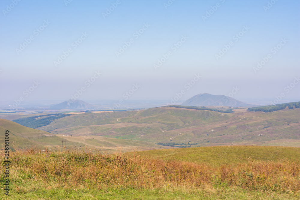 Fototapeta premium Mountains And plains away in summer
