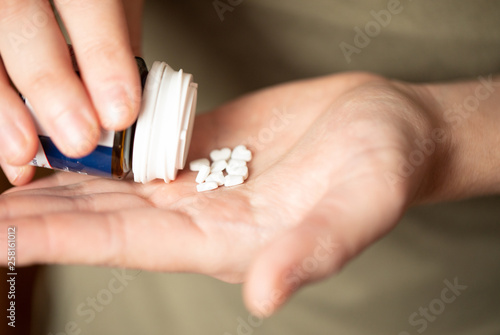 Colorful pills and medicines in the hand 