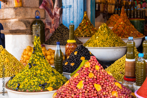 Selection of pickled olives on a traditional Moroccan market (souk) in Medina of Essaouira, Morocco