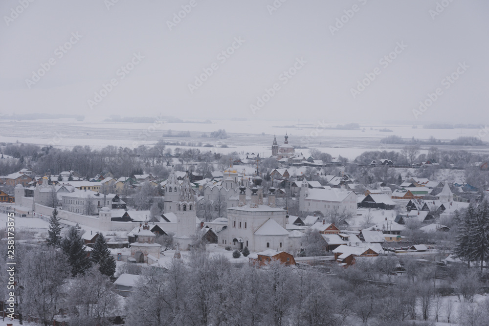 Suzdal from the height of the bell tower in the winter day. Suzdal from the height of the bell tower in the winter day.