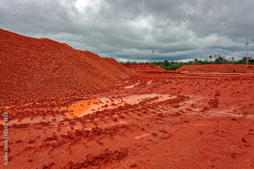 Red mud - toxic residue of aluminum production polluting the soil on huge area. Guinea, Africa.