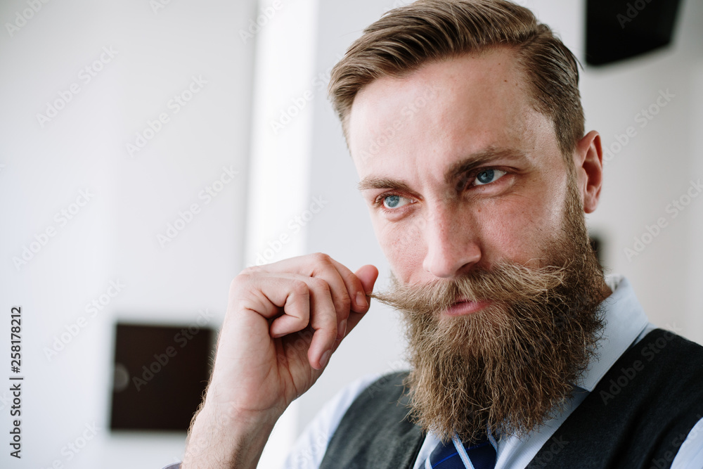 Handsome young bearded hipster businessman Handsome young bearded hipster businessman