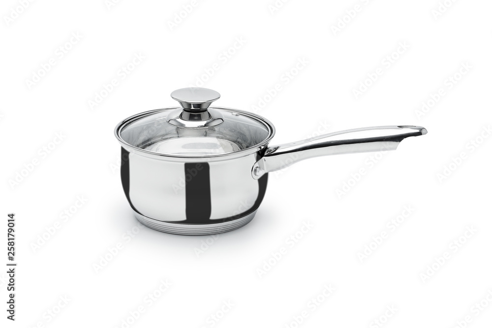 Kitchenware cauldron pot silver chrome-plated metal glass cover isolate on a white background. Throws a shadow. Kitchenware cauldron pot silver chrome-plated metal glass cover isolate on a white background. Throws a shadow.