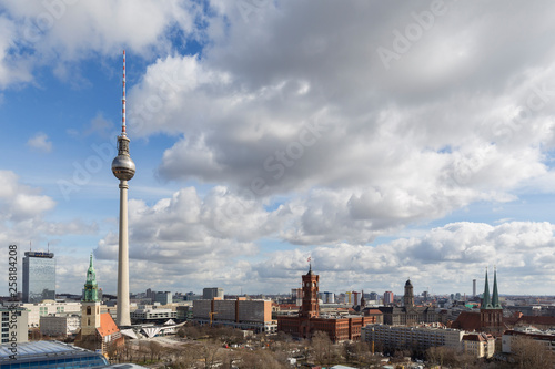 St. Marienkirche, Fernsehturm TV Tower, Rotes Rathaus and other landmarks and buildings at the downtown Berlin, Germany, on a sunny day in the early spring.