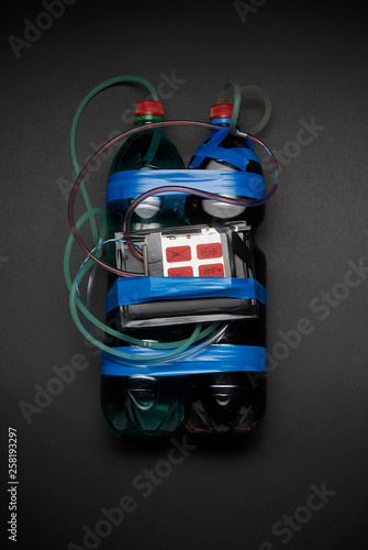 Tubes and bottles taped to device