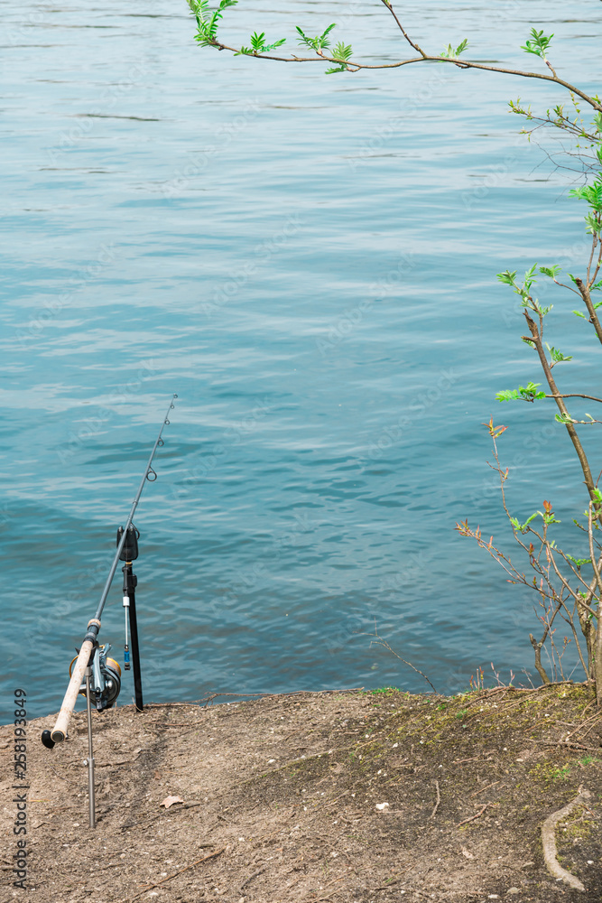 fishing rod on coastline, along river