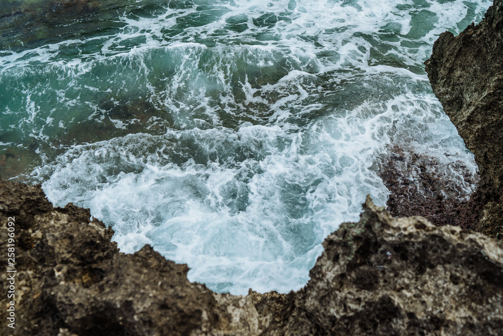 Seascape of beach with transparent sea, blue sky, palms and boats.Taken at Sabang, Puerto Galera, Mindoro island, Philippines