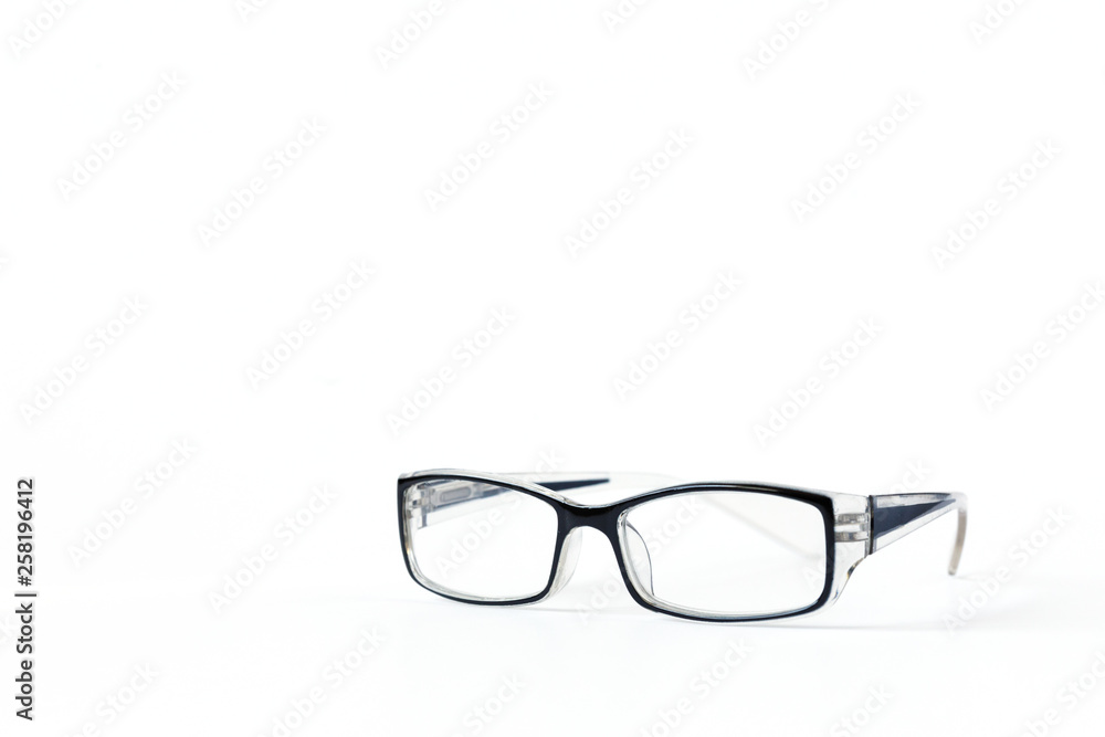 Glasses in a black frame on a white isolated background.copy space Glasses in a black frame on a white isolated background.copy space
