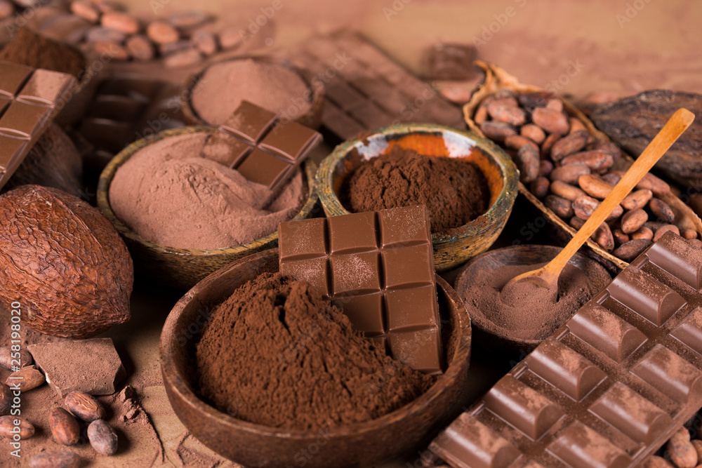 Chocolate bar, candy sweet, cacao beans and powder Chocolate bar, candy sweet, cacao beans and powder