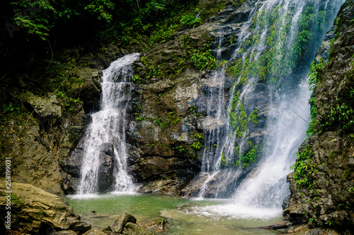waterfall in the forest on the island of Mindoro, the Philippines photo