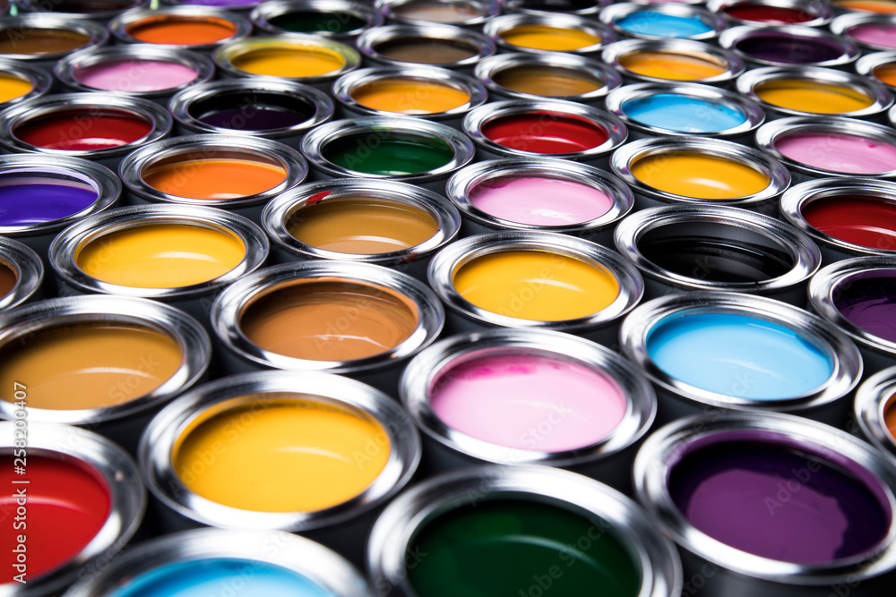 Group of tin metal cans with color paint Group of tin metal cans with color paint