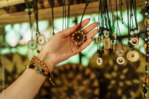 Handmade wooden keychain souvenirs from Philippines photo