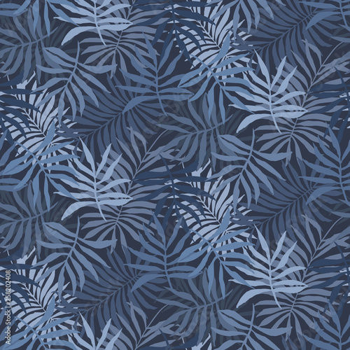 Deep dark blue seamless pattern with overlap mess of fern tropical leaves. Trendy pale colors exotic plants texture for textile  wrapping paper  surface  wallpaper  background