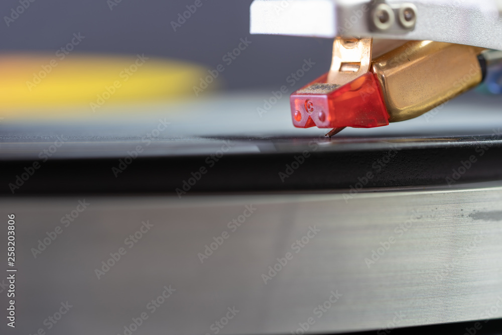 Fototapeta premium Vintage Record Player Needle Closeup On Album