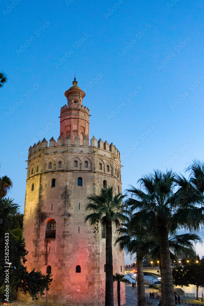 The Golden Tower (Torre del Oro) in Seville, Spain, is located at the margin of the Guadalquivir river and was built in the XIII century by the muslims ruling the area at the time.