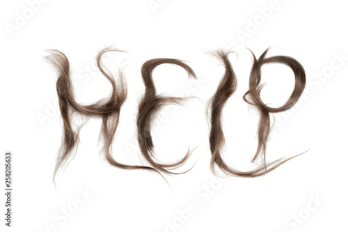 Word  Help  made by brown hair. Haircare concept