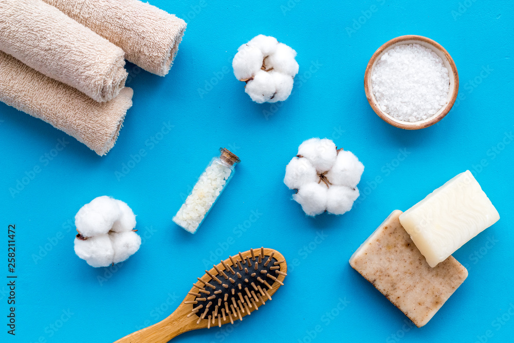 Eco-friendly cosmetics and zero waste set for spa on blue background top view Eco-friendly cosmetics and zero waste set for spa on blue background top view