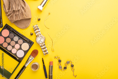 Woman summer accessories collage on yellow background, flat lay, top view. Banner