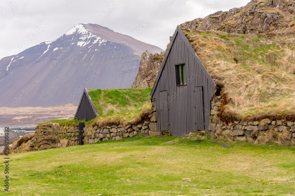 Stone Fence and Grassy Roofs in the Countryside near Borgarnes, Iceland