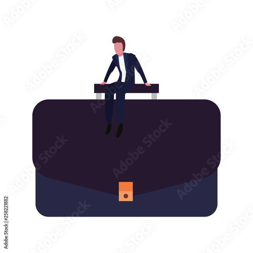 businessman sitting on suitcase