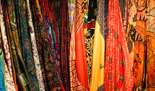 Color scarves vertically hanging in the Indian market.