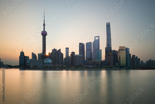 The Bund early in the morning at sunrise. View of Pudong and Huangpu river from The Bund in Shanghai  China
