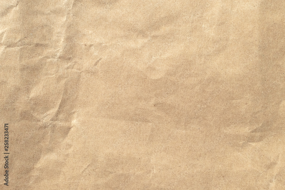 Naklejka premium Brown crumpled paper texture background.