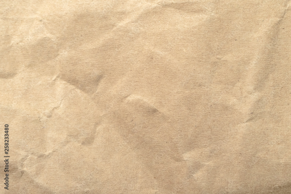 Brown crumpled paper texture background. Brown crumpled paper texture background.