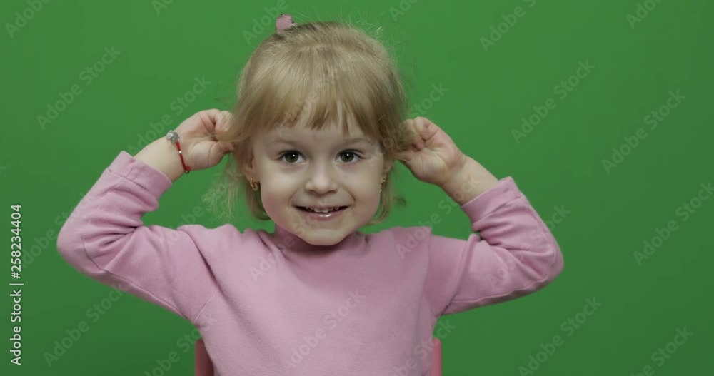 Happy three years old child. Cute girl smiling and making faces. Chroma Key Happy three years old child. Cute girl smiling and making faces. Chroma Key