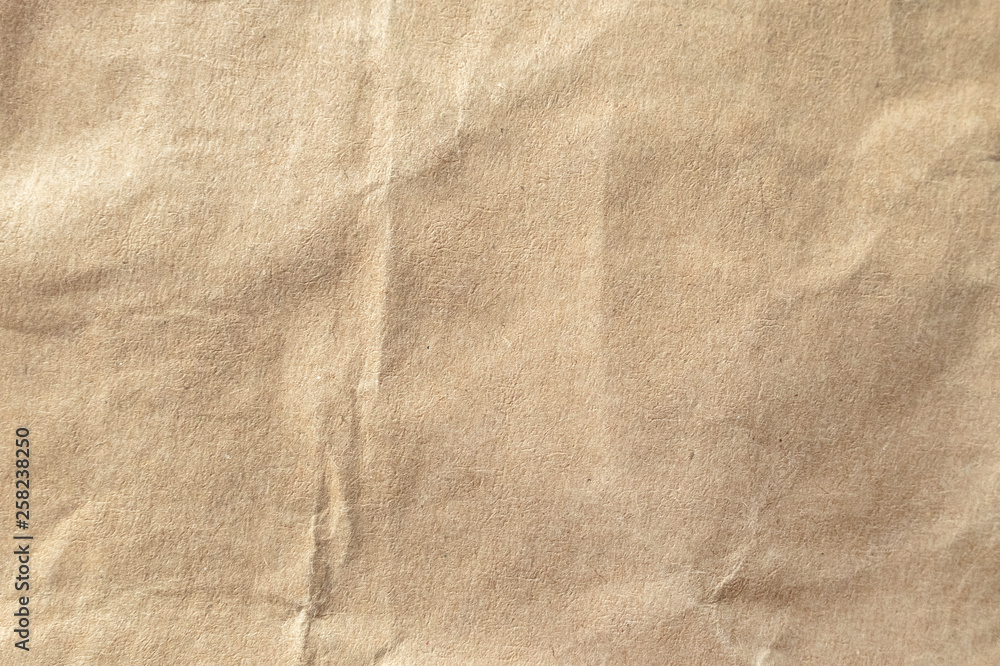 Naklejka premium Brown crumpled paper texture background.
