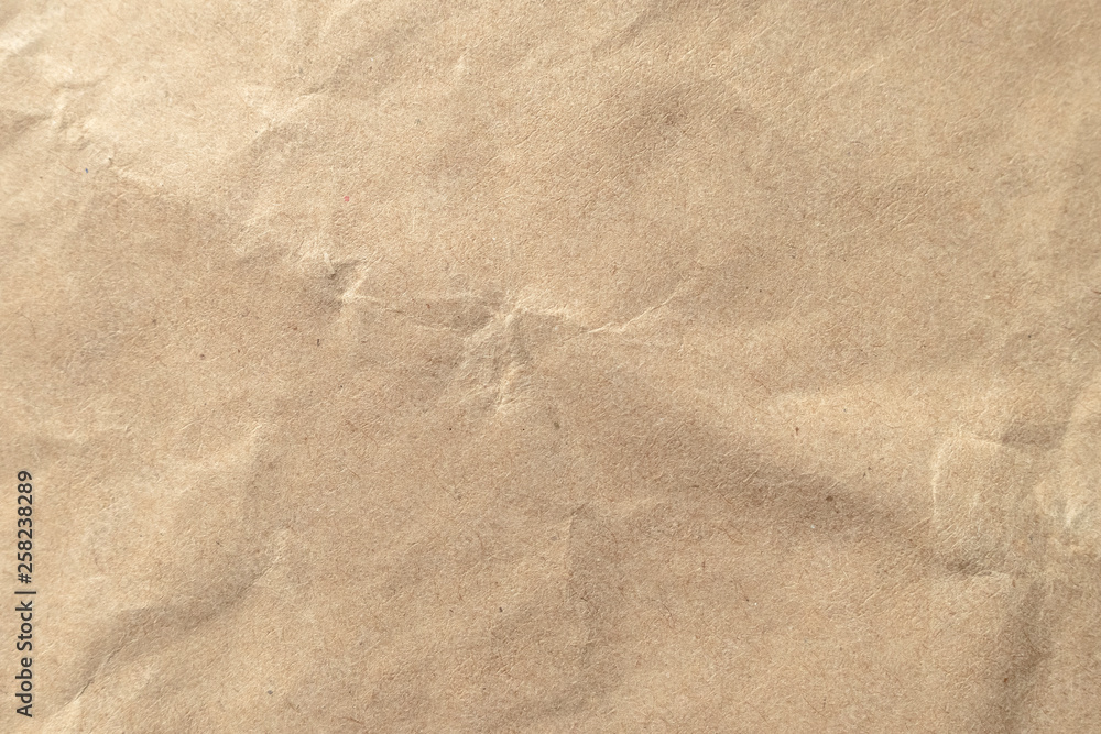 Brown crumpled paper texture background. Brown crumpled paper texture background.