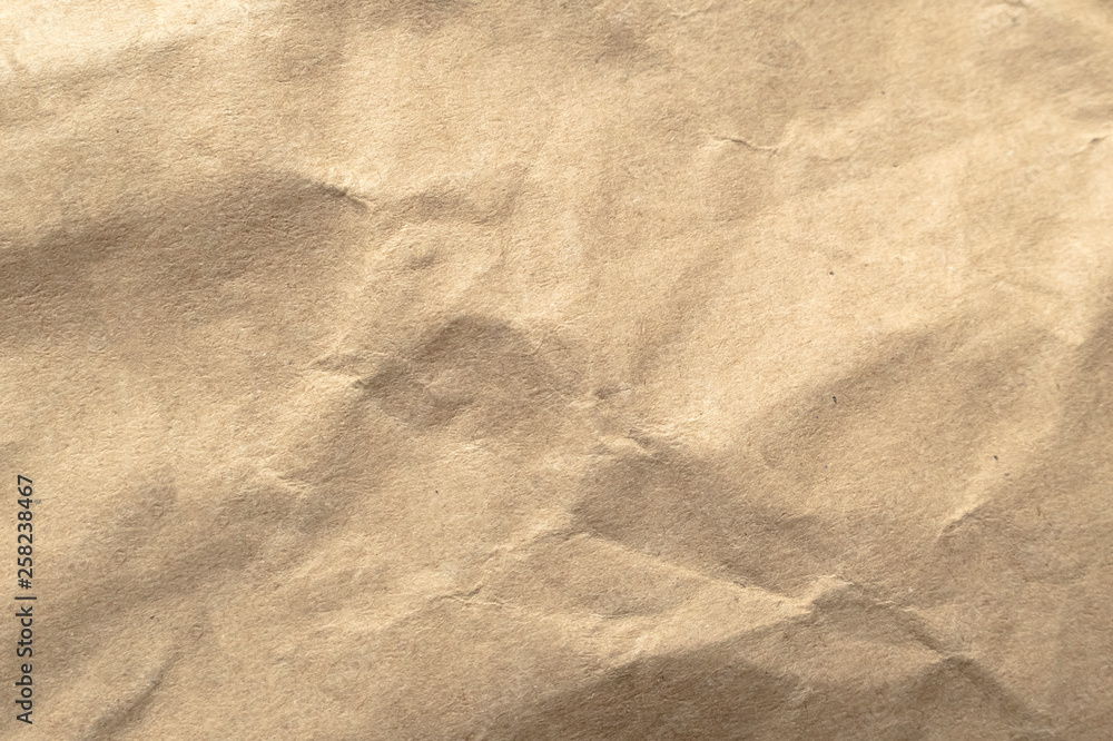 Brown crumpled paper texture background. Brown crumpled paper texture background.