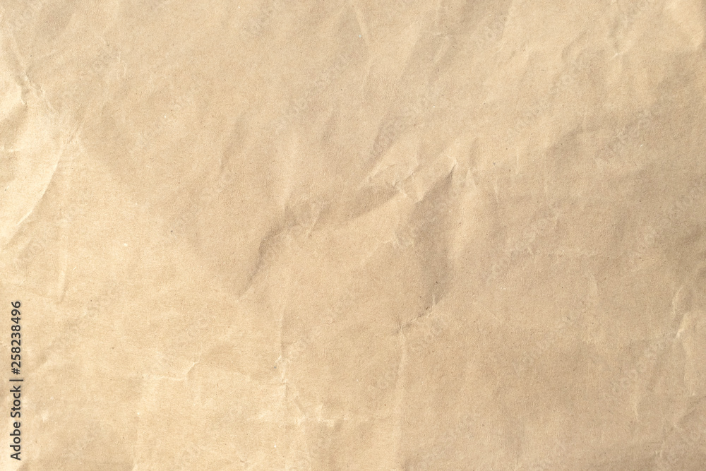 Brown crumpled paper texture background. Brown crumpled paper texture background.