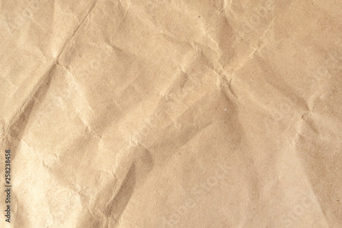 Brown crumpled paper texture background.