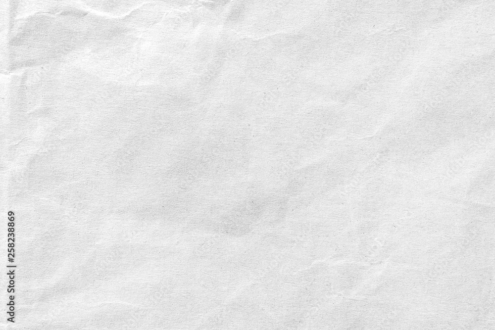 White crumpled paper texture background. Close-up. White crumpled paper texture background. Close-up.