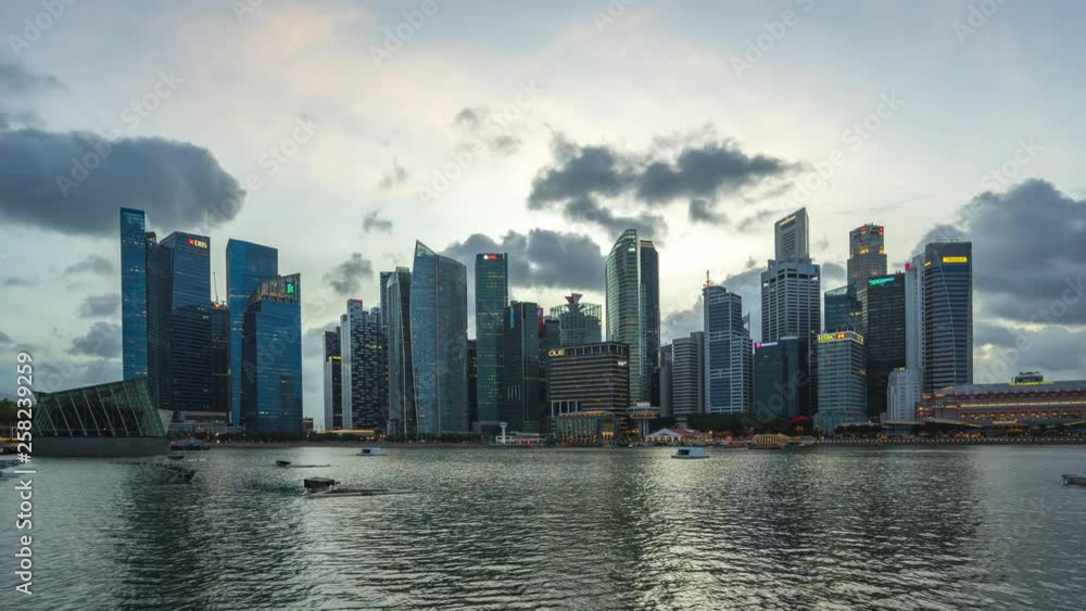 Singapore city skyline with landmark buildings day to night time lapse in Singapore Singapore city skyline with landmark buildings day to night time lapse in Singapore