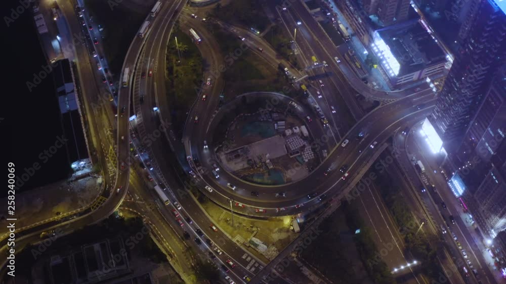 Busy highway roundabout in downtown of Hong Kong at night Busy highway roundabout in downtown of Hong Kong at night