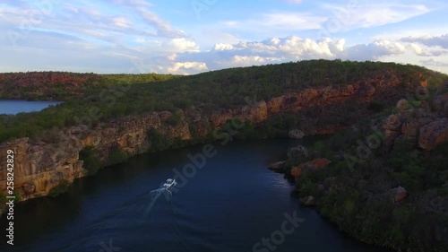 Drone record a boat sailing between the Xingó Canyons, Piranhas's River, Brazil 