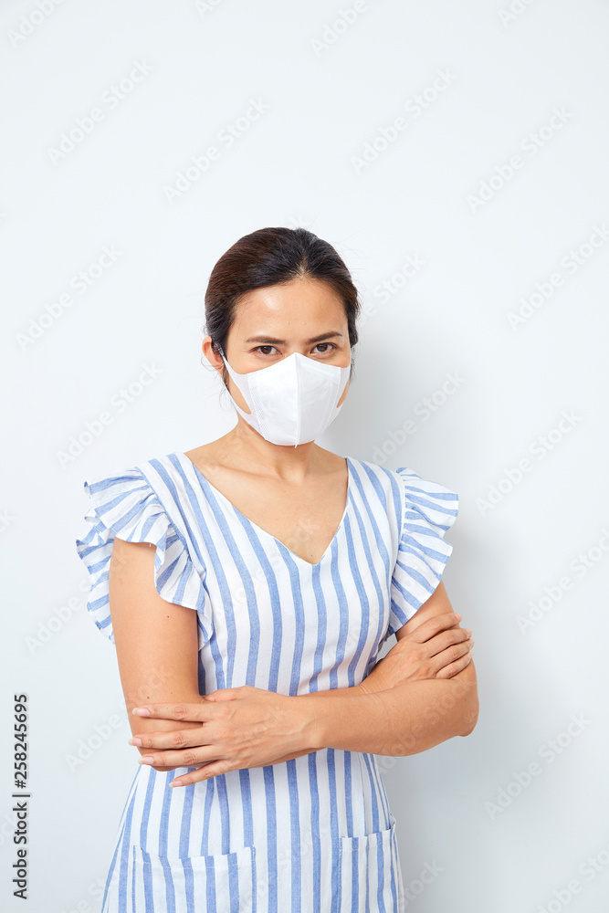 Asian woman wearing face mask Asian woman wearing face mask