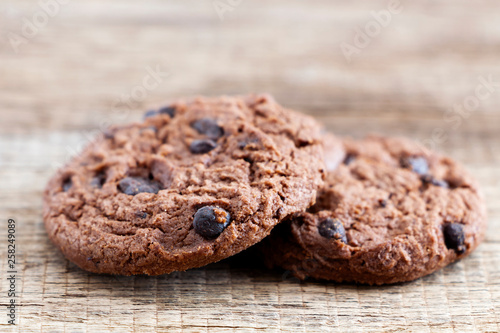 Chocolate chip cookies on wood table. Copy space for your text or image.
