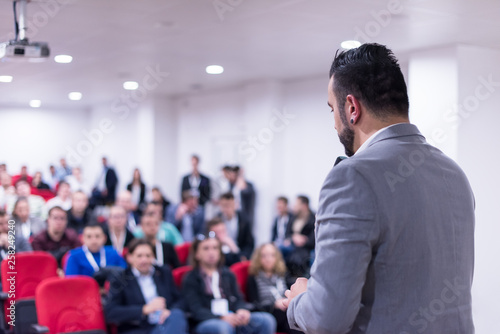 successful businessman giving presentations at conference room