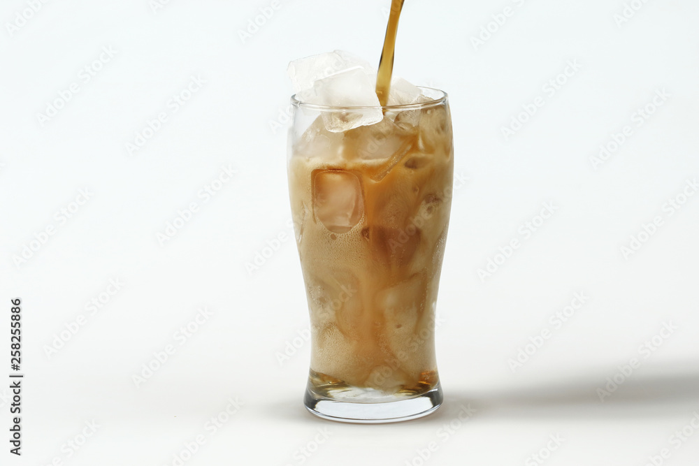 Cola in glass with ice on white background Cola in glass with ice on white background