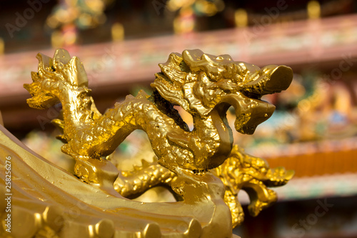 Golden dragon sculpture on the roof