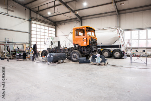 Paint shop and lighting in the large trucks and passenger cars are painted and also repaired
