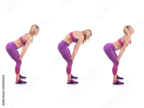 Beautiful young pregnant woman doing exercises on a white background. Early pregnancy.