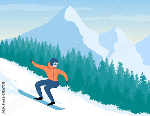 Snowboarder on background of mountains and trees