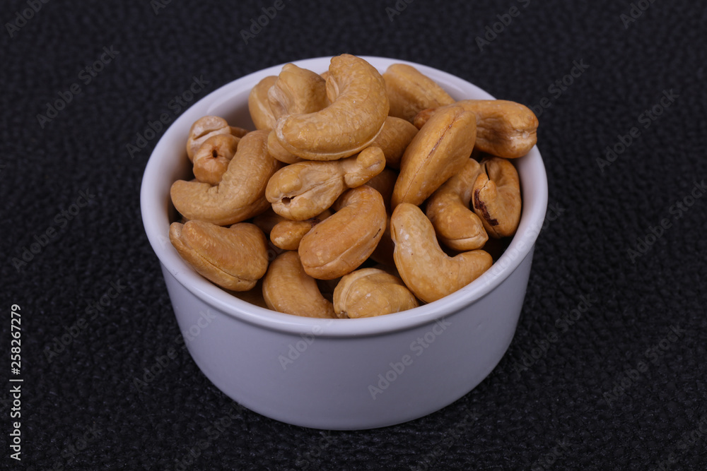 Cashew nuts heap in the bowl Cashew nuts heap in the bowl