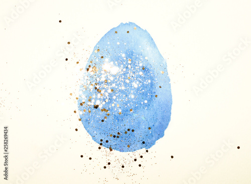 Blue watercolor Easter egg with golden glitter in vintage colors