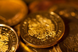 close up of gold coins, the macrophoto with a small depth of sharpness